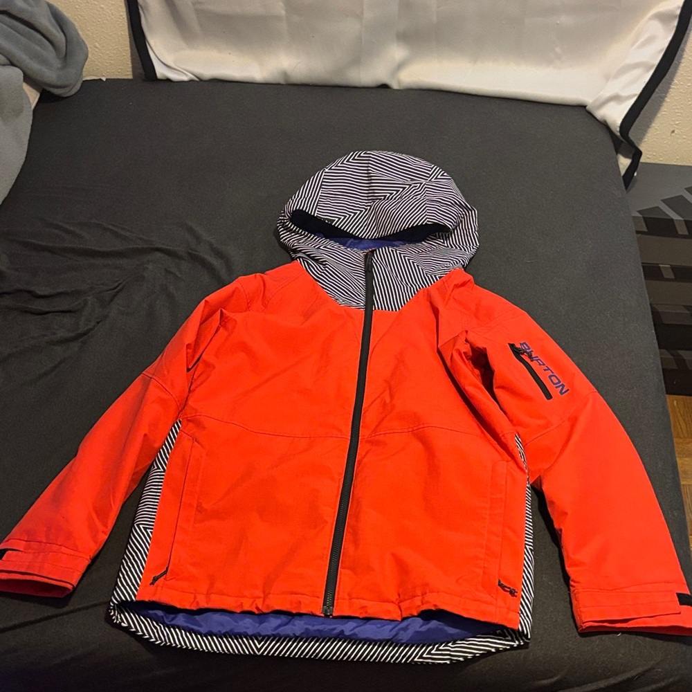 Men’s Orange with black and white stripe Ski Jacket with hood.